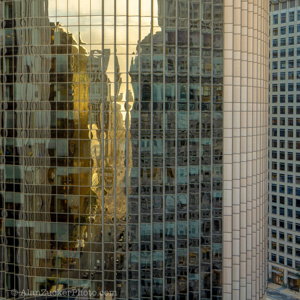 Downtown San Francisco office building, lit by the morning sun and reflecting world back.